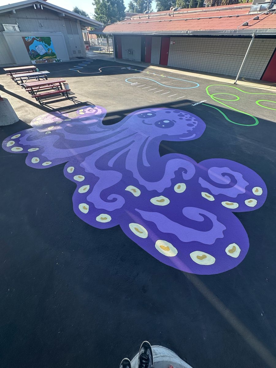 Purple octopus blacktop mural